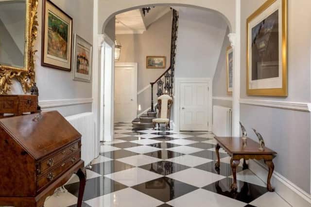 This immaculately refurbished townhouse is set out over four floors, with reception rooms, a pillared entrance hall and an impressive living, dining room and kitchen, and sits located in Edinburgh's West End. Price: 1,500,000 GBP