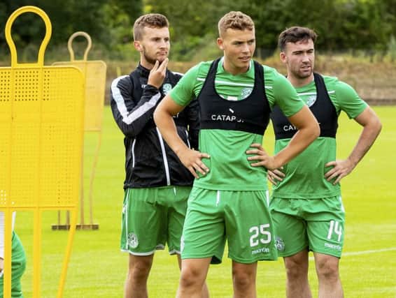 Tom James, Ryan Porteous and Stevie Mallan in training at HTC