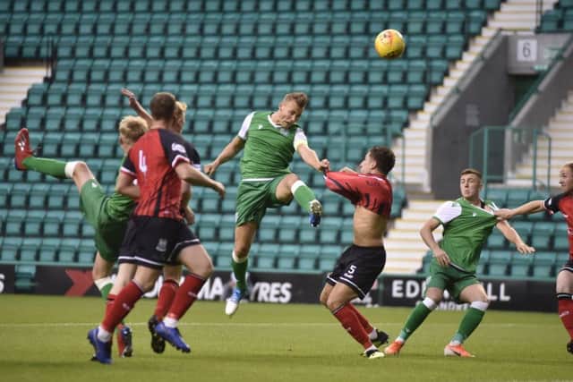 Ryan Porteous powers home the opening goal at Easter Road. Picture: Andrew O'Brien