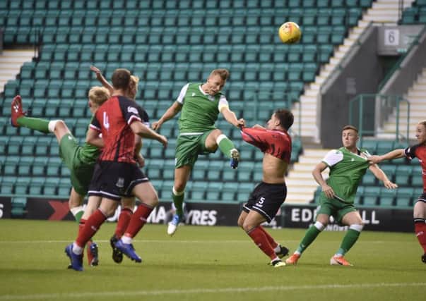 Ryan Porteous powers home the opening goal at Easter Road. Picture: Andrew O'Brien