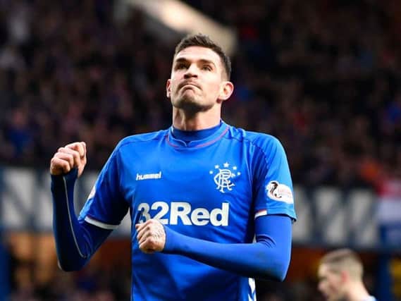 Kyle Lafferty rues a missed chance for Rangers. The striker has claimed he took a pay cut to join the Ibrox side from Hearts