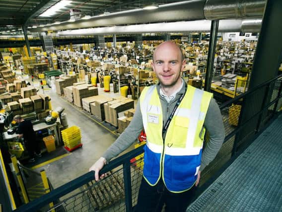 Graham Allison, general manager at Amazon's Dunfermline centre, wants Scotland's SMEs to embrace digital technology. Picture: Ian Rutherford