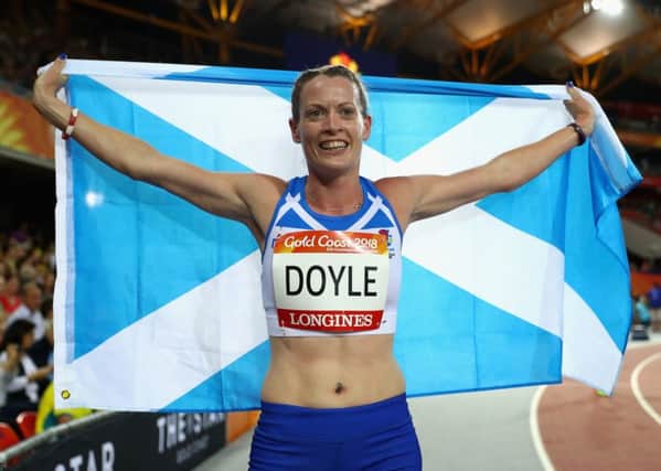 Eilidh Doyle celebrates winning silver in the 400m hurdles at the 2018 Commonwealth Games in Gold Coast. Picture: Michael Steele/Getty Images