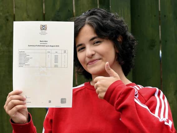 Deniz Atici with her exam results.