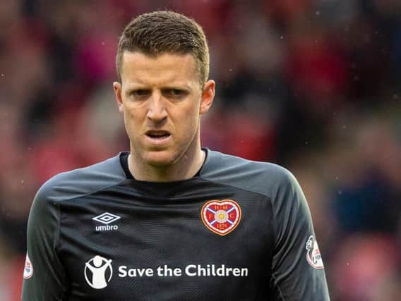 Hearts goalkeeper Colin Doyle has penned a new contract.