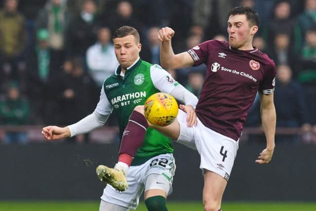 Hibs' Florian Kamberi and Hearts' John Souttar have admirers south of the border. Pic: SNS