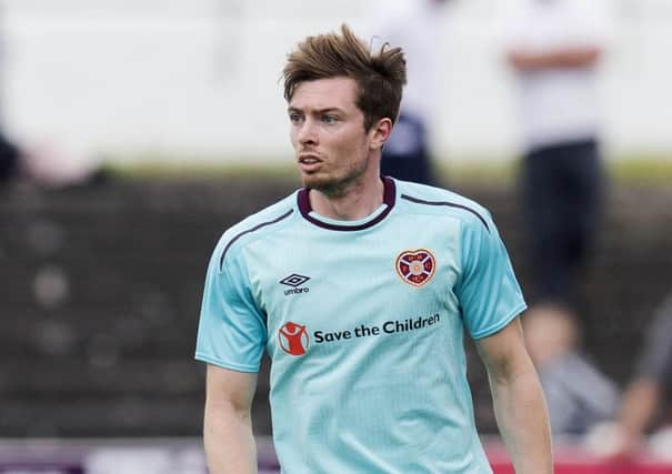 Craig Wighton's Hearts career has been blighted by injury. Pic: SNS