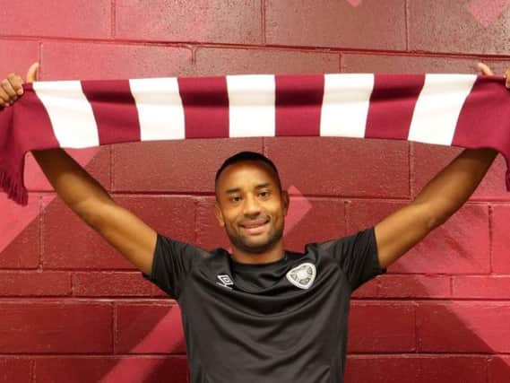 Hearts unveil new signing Loic Damour