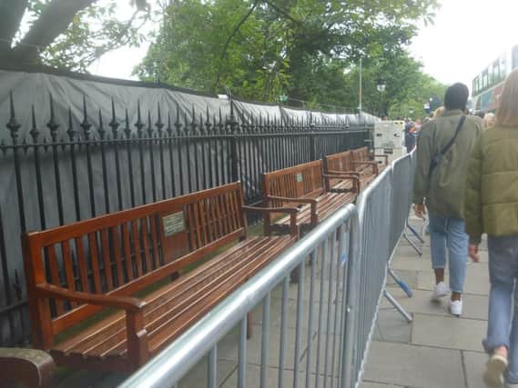 Benches on Princes Street have been fenced off. Picture: Juliet Wilson