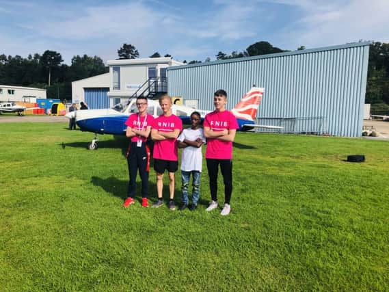 Four blind and partially sighted young people from Edinburgh had a chance to experience the thrill of flying and have their adventure shown coast to coast on American television.