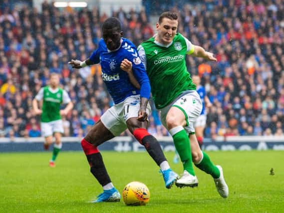 Paul Hanlon coming up against difficult opposition in Sheyi Ojo. Picture: SNS