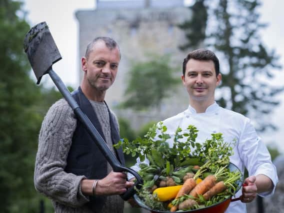Derek Johnstone and Pete Jackson with garden produce.