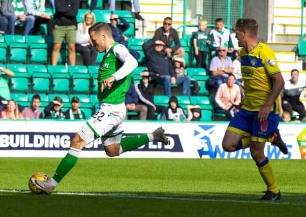 Hibs' Florain Kamberi scores against Morton to make it 4-3 in extra time. Pic: SNS