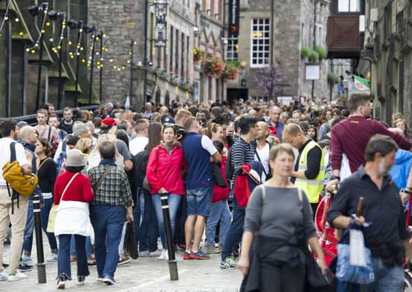 Tourists pack the Royal Mile during the Festival. Picture: Ian Rutherford