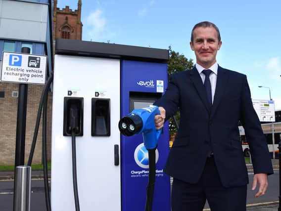 Transport secretary Michael Matheson with one of the latest chargers in Kilmarnock today. Picture: East Ayrshire Council