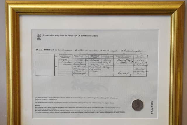 Among the items on display are a copy of Conan Doyle's original birth certificate