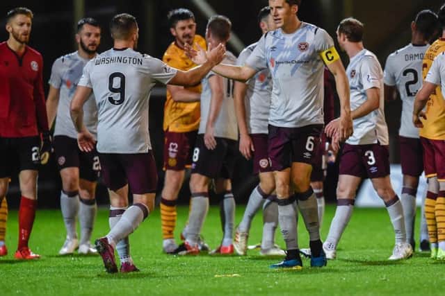 Conor Washington and Christophe Berra congratulate each other at full-time.