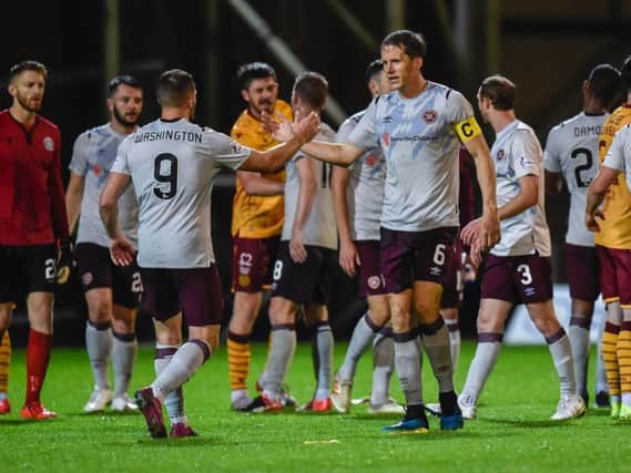 Conor Washington and Christophe Berra congratulate each other at full-time.