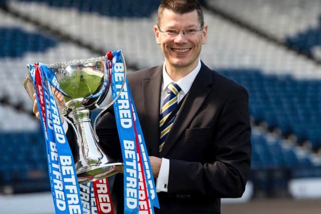 SPFL chief Neil Doncaster with the Betfred Cup trophy.