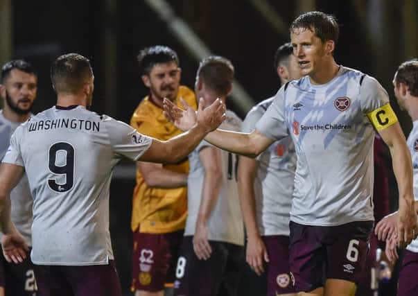 Hearts captain Christophe Berra, right, celebrates with Connor Washington at full-time