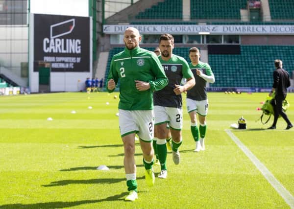 David Gray and Darren McGregor are two stalwarts of the Hibs defence. Pic: SNS