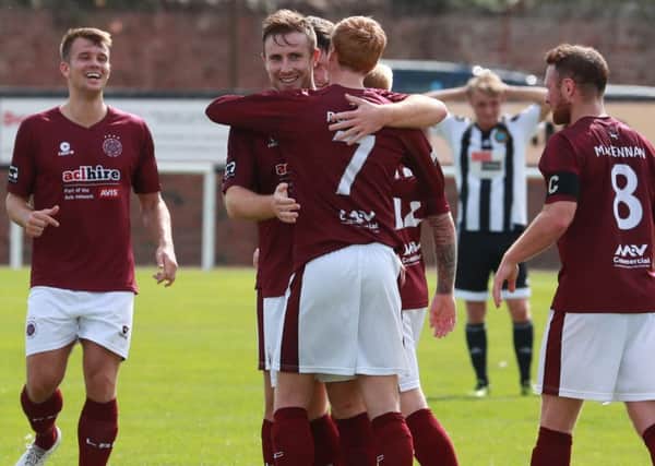Linlithgow Roses players celebrate Ross Allums strike. Picture: Stewart Attwood