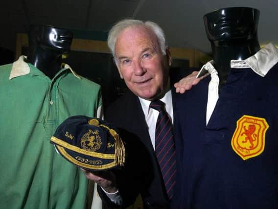 Lawrie Reilly's medals sold for around 12,000 after going under the hammer in Edinburgh.