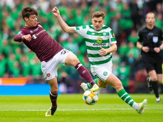 Aaron Hickey in action against James Forrest