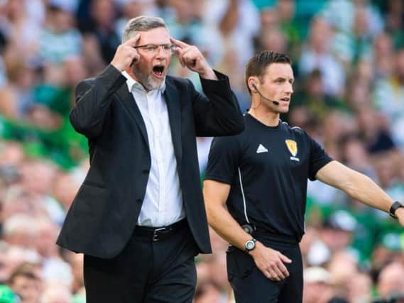 Craig Levein saw Hearts suffer defeat at Celtic Park.