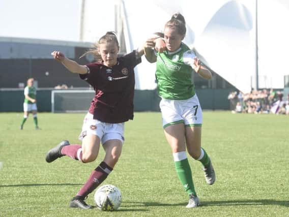 Jamie Lee-Napier battles for the ball with Hearts' Claire Delworth during Sunday's Scottish Cup clash at the Oriam