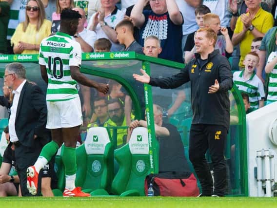 Vakoun Bayo is congratulated by Neil Lennon. Picture: SNS