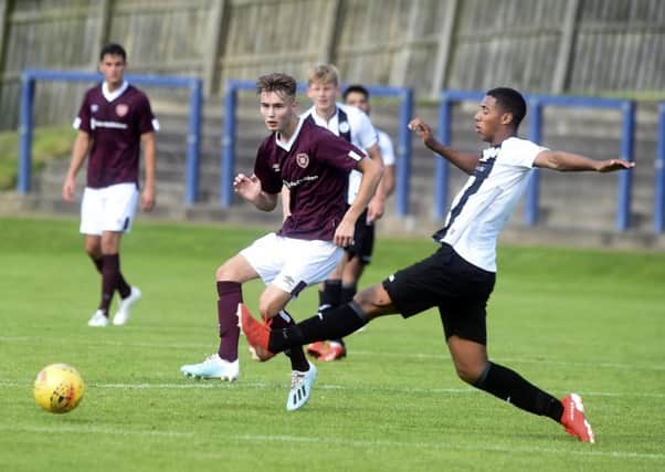 Harry Cochrane tries to start an attack for Hearts Reserves against St Mirren. Pic: Lisa Ferguson
