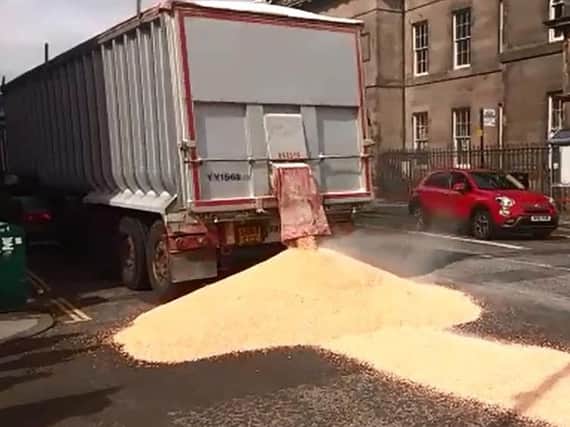 Watch as lorry sheds load of maize all over busy Leith street