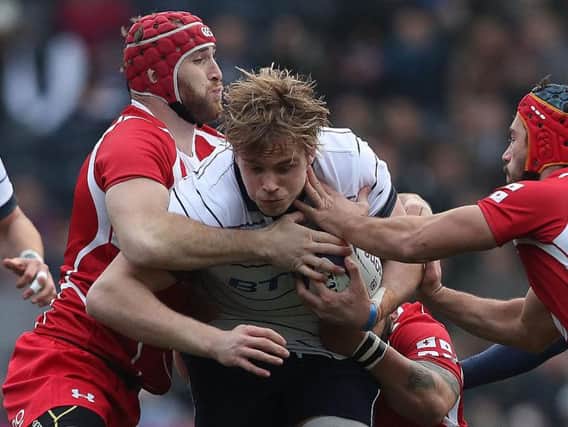 Richie Gray of Scotland is tackled by Beka Bitsadze of Georgia during the Autumn Test Match between Scotland and Georgia in November 2016 (Photo: Ian MacNicol/Getty Images)