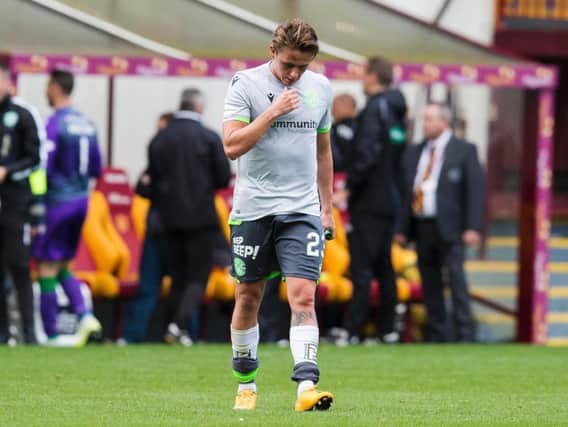 Scott Allan trudges off the Fir Park pitch after the loss to Motherwell. Picture: SNS