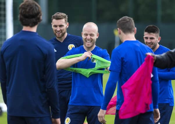 Hearts striker Steven Naismith shares a joke during Scotland training. Pic: SNS