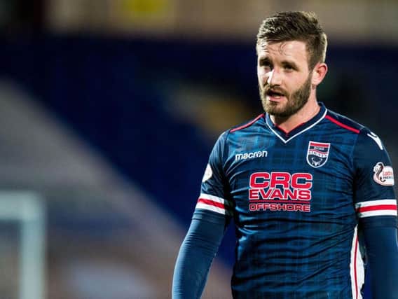 Jason Naismith in action for Ross County