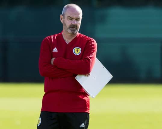Steve Clarke looks on during a Scotland training session at Oriam