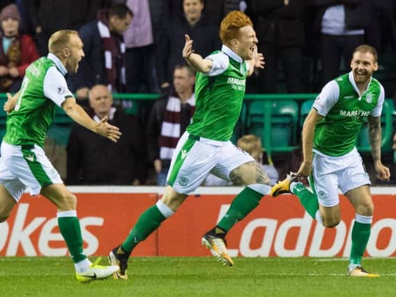 Simon Murray celebrates a goal for Hibs against Hearts at Easter Road