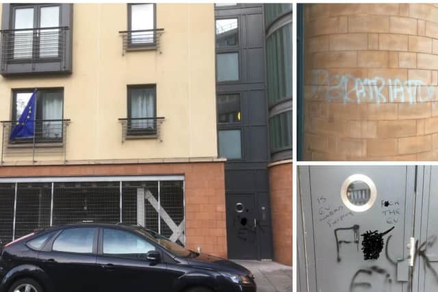 Vandals left graffiti on the entrance door to the block of flats in Castle Wynd. Pic: Anne Balfour.