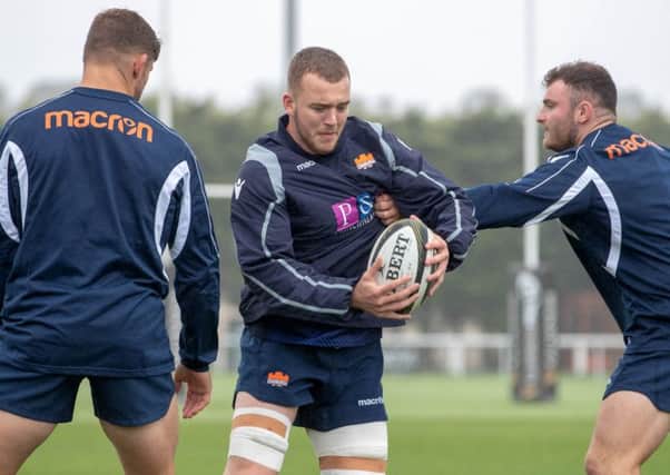 Lewis Carmichael, centre, suffered concussion and then a freak training ground accident