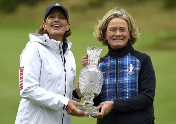 Team USA captain Juli Inksterand Team Europe captain Catriona Matthew pose with the trophy at Gleneagles Golf Club