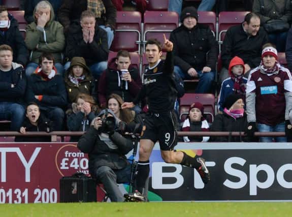 John Sutton scores against Hearts back in 2014. Picture: SNS