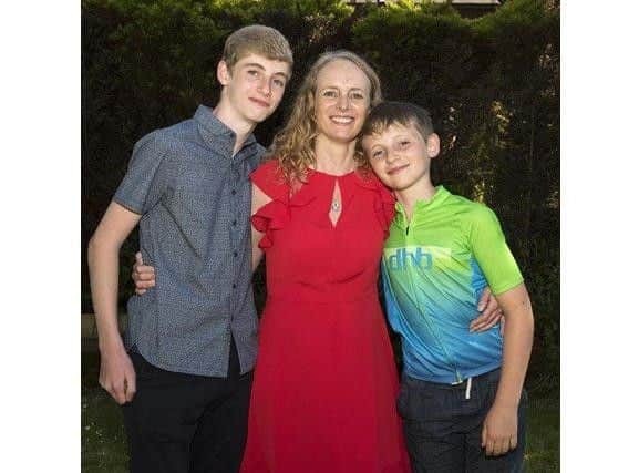 The boys with their mum, Fay.