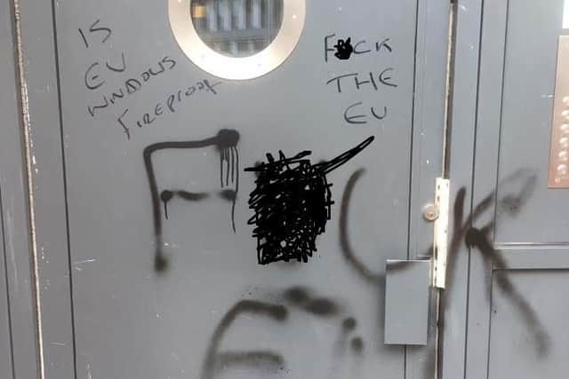 The graffiti on the front door. Pic: Anne Balfour.