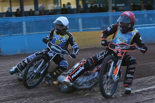 Sam Masters, right, gets in front of Danny King. Picture: Jack Cupido