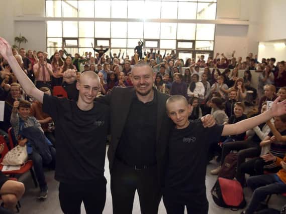 The brothers after the head shave.