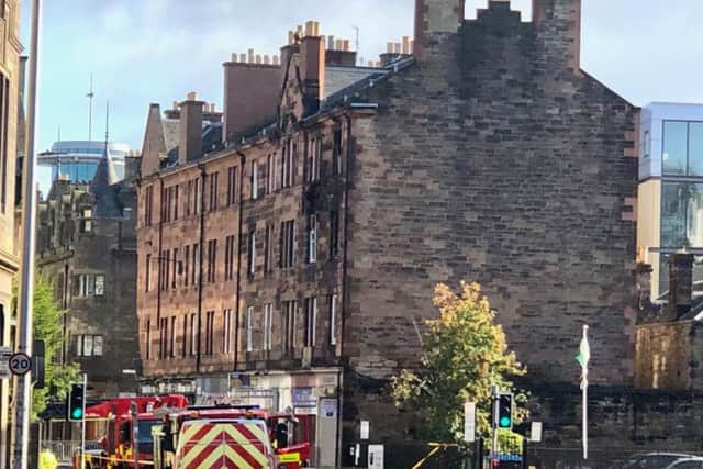 The fire just yards from Tollcross Primary School claimed the life of one person