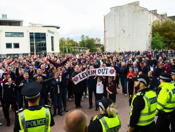 Hearts fans voice their displeasure after the game. Picture: SNS