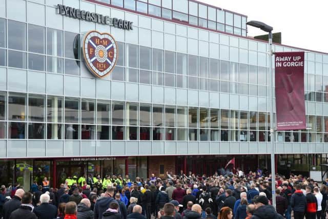 Hearts fans gather outside in Foundation Plaza. Picture: SNS